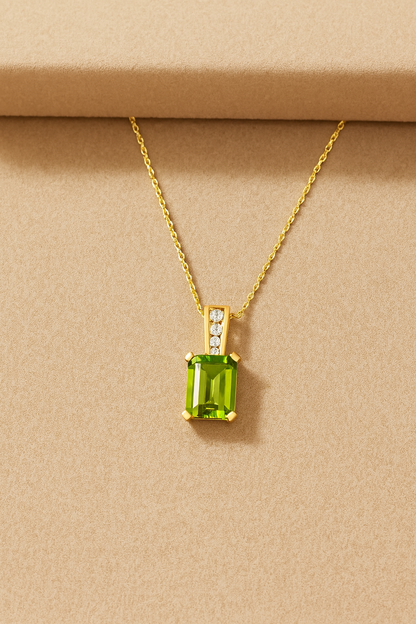 14K Yellow Gold 2.91 TCW Natural Octagon Cut Peridot and White Diamond Pendant